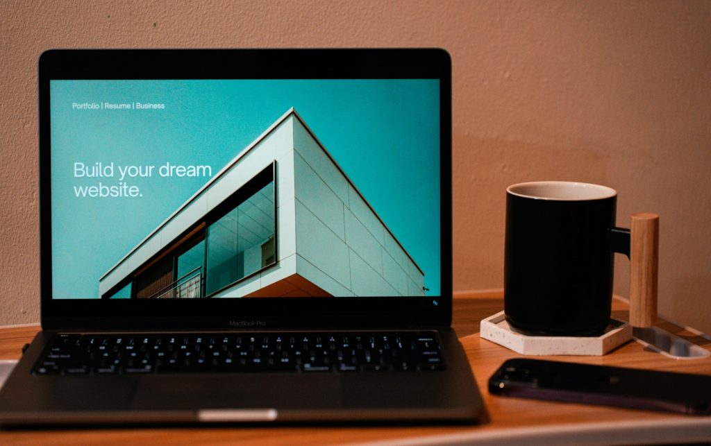 a laptop and coffee cup