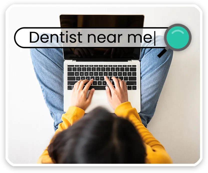 SEO Person Searching for Dentist on a Laptop